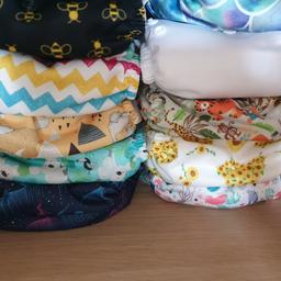 9 nappies -
preloved but excellent condition -
Bees
Chevron
white

brand new -
Polar Bears
Koala
Northern Lights
Sunflowers
Jungle
Ocean

excellent starter bundle for using cloth at a great price with two exclusive and discontinued prints (Chevron and bees)
£100 inc p&p