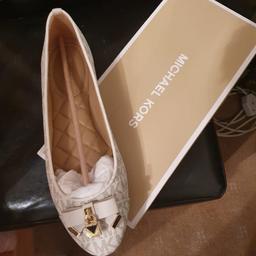 lovey and brand new elegant mk brand new size 7 for sale lovely and comfortable not been used at all.stunning detail with nice art of gold and of white, was bwrt for £115. selling for £90. thank you