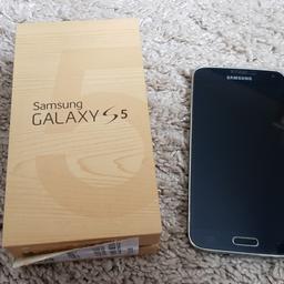 Samsung Galaxy s5 slight few Mark's on enged ee network no charger