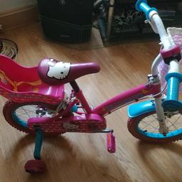 14 INCH WHEEL HELLO KITTY BICYCLE
I'd say ages 3-6 years old

EXCELLENT CONDITION
Comes with front basket
Comes with Teddy seat at back
Comes with stabilizers

Unfortunately my daughter is to big for it. 

£30