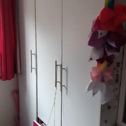 Girls 3 door wardrobe with drawers and shelving. All good condition apart from the drawers need messing with as they dont seem to be sliding in correctly and a few little chips but no noticeable. Needs collecting this weekend.

Now dismantled ready for collection. cannot deliver