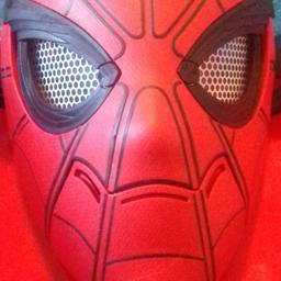 spiderman mask you place your chin on the  black bit nd the eyes move this was not cheap need it gone
