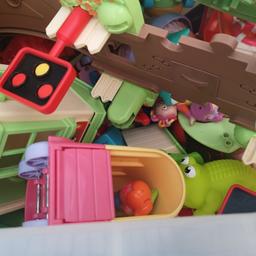 large box of happyland figures, buildings, train and animals. door missing of fire station and house but doesn't  interfere with play. 
excellent condition