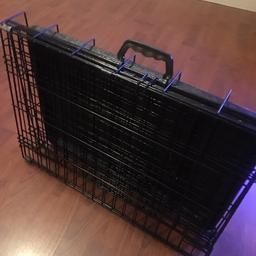 Small / medium portable dog or cat cage, comes with carrying handle & locks to secure your pet. 
Perfect condition