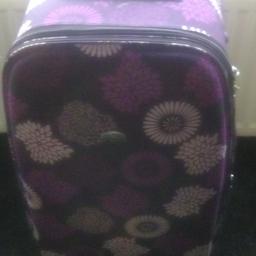purple flowered suitcase in used condition but still good. smoke free home.collection only.
