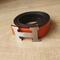 new and very good quality Hermes belt for her.