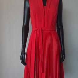 Beautiful dress from Karen Millen.
Worn once and cleaned.
Burnt Orange, crepe material.