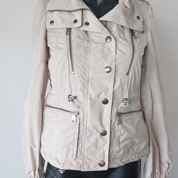 Burberry Women's Jacket/Rain coat.
Genuine Burberry Brit, polyester rain jacket.
Immaculate condition, genuinely worn only a couple of times. Size 4 but I was a size 6-8 and fittted me perfectly.