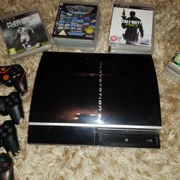 PS3 with 4 controllers and loads of games