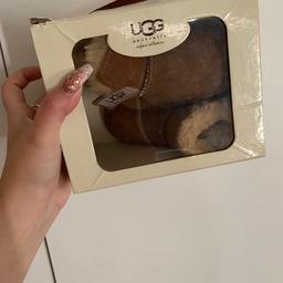 In colour chestnut 
Infant size 2-3 with soft bottom 
Immaculate condition box has wear and tear 
Smoke and pet free home 
Can also post