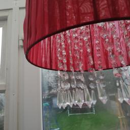 red lamp shade with hanging crystals. collection only please