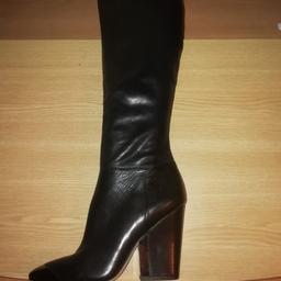 very very well made, size UK 4 A¹ⁿqqdesigner boots in soft black leather. They are knee high with a pointy metal toe cap & part of the heel with a metal trim. They have a 3 inch chunky heel and an inner half zip fastening. Only worn twice, briefly so still in good as new condition... rrp £155