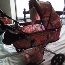 LOVELY LITTLE GIRLS PRAM 
ONLY 9-99
PLEASE TAKE A LOOK AT MY OTHER ADDS