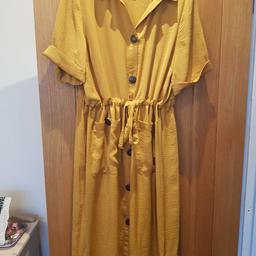 Lovely mustard yellow dress. size 16. Never worn but have removed tags. condition is new. collection from leigh on sea