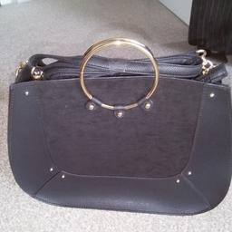 lovely brand new handbag with tag, part faux suede on front, bought to use as gift but now not needed. bargain as original price was £12 (as seen on photo). Cash on pick up only please.