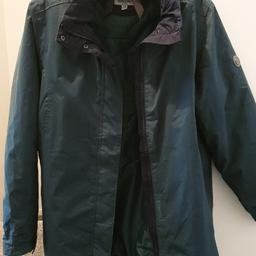 size 18 jacket..drawstring bottom..2  pockets with inside pocket..hood inside collar.. green in colour.. only used a cpl of times.. emergency buy while on holiday.. no longer needed.. £ 12 for a quick sale.cash and collection only. no offers as it is in excellent  condition.