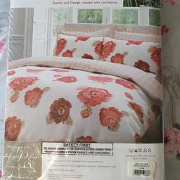 Brand new, still sealed, super king size duvet cover, includes 4 pillow cases. Beautiful rose pattern & striped reverse. Collection only from Chilton.