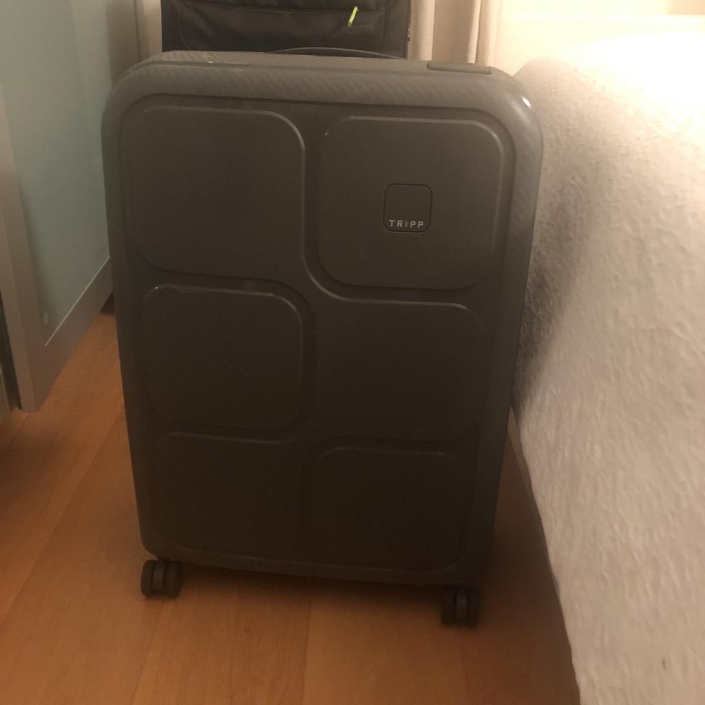 Tripp cheap superlock suitcase