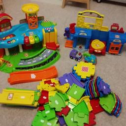 Toot toot garage with additional road pieces. Include two cars.
I will add garage as well however the sound is not working on that one anymore.
Loads of fun and hours of play!