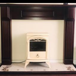 complete set with fire suround and the arth with a lovely modern fire that you can have lit up with a flame affect wood burner and has heat settings to have high or low heat. its fitted with a plug so ready to go. measurements are on the pic