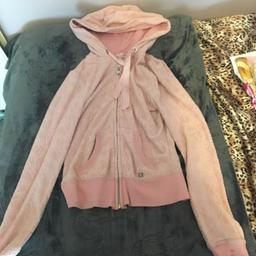 Pink lipsy zip top, has a little lipstick stain on the sleeve.