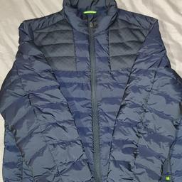 new and used navy blue coat . only worn once will fit a medium to large maybe a small . very padded and in very good condition.  can be collected or posted out .