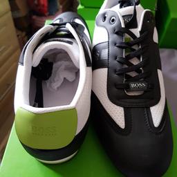 mens black and white trainers , size 9 . never been worn still in the box . can be collected or posted out . in very good condition.