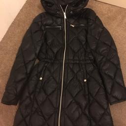 Michael Kors duck down coat in a size M which fits a size 10. This has a small rip in the inside of the hood as shown on the pictures but could easily be sewn up.