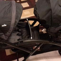 Joie double pram. Lightweight at 10.5kg. One handed folding. Back seat lies flat for new born or to place car seat on. No adapters required. Basket underneath. Steers very well & easy for a double pram. Brand new rain cover included. Pram is used condition but been kept clean & tidy.