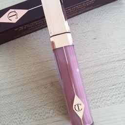 Brand new. Unused. 
Bought for a gift.  
Charlotte Tilburry.
Pillow talk - pinky nude lipgloss. 
£19 on site. 
Buyer pays postage.