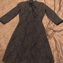 Beautiful fitted Dress from Next black and gold detail print with tags in excellent condition brand new comes from pet free home.