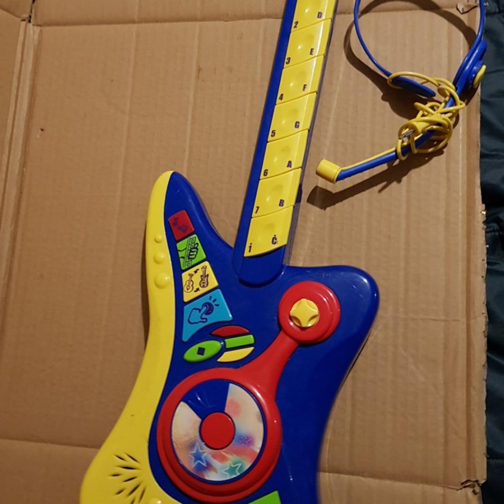 ELECTRIC GUITAR and microphone in Bolton for £3.00 for sale Shpock