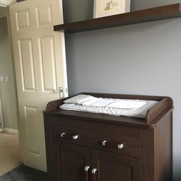 Cost £600 new, reduced by 50% from £1200 8 years ago bought from Glasgow Pram Centre.
Items include changing table, Wardrobe and cot bed.
Cot bed measures 80cm x 160cm
You see by the pictures it has been used for both my children and can by styled for both a boy or girl.
The colour is a walnut and I have matching picture frames and a shelf if you would like those to be included too.
The furniture is fully assembled and must be removed from the 1st floor. 
No offers please and collection only