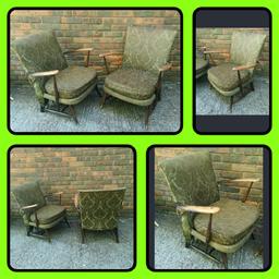 2 X Ercol Low Armchairs Pair...dark Wood With Green Cushions. Condition is Used.
Unfortunately I do not know the model number of these chairs
Cosmetic condition sold as seen
Both chairs are structurally sound very solid
One chair needs a little bit of restitching as seen in photograph
There is ware marks to the wood on the armrests as you can see
So these pair of chairs will need a little bit of restoration/cleaning

Any questions please ask and I'll be happy to help