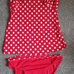 Red polkadot tankini, maternity wear, size 16, worn a couple of times, in great condition.

Thanks,