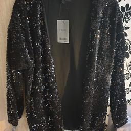 black size L brand new from smoke and pet free home. collection from woodlaithes village area