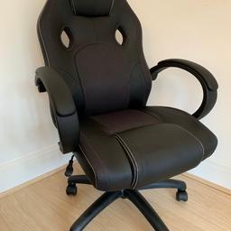 Very comfortable chair, only take. Out of box to put it together, so perfect condition

Adjusts height and leans back, dials adjusts lean tension.