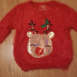 Red reindeer jumper