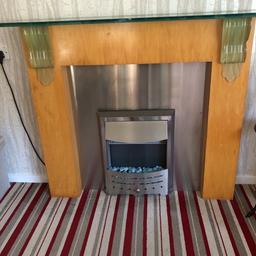 Beautifl electric fire. Only selling because i got a new one. Slight chip as seen on pic but can’t really tell it’s there.