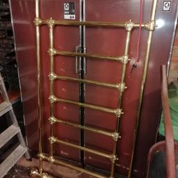 A full brass frame with front, side bars and back brass frame. Lots of detail. Impressive when it fits to a double bed. Collection Catford se6 only