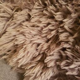 large brown rug in good condition no marks width 5 half foot x 7 half foot long. the rug as been rolled up so needs to good brushing through happy for yous to come and view 
