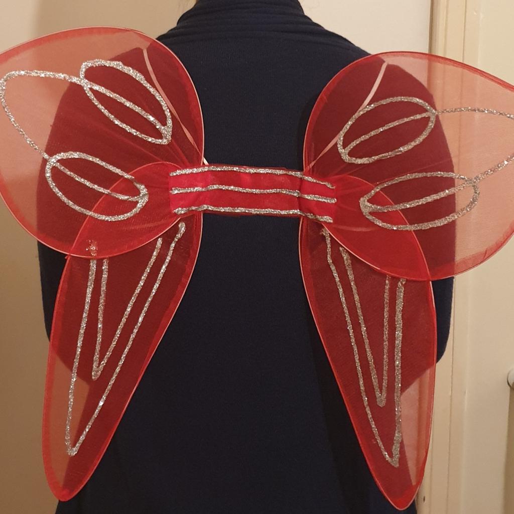 Fairy wings for costume/halloween party. Longest dimension is 17inches. Elastic arm bands stretchable, so it also fits adults.