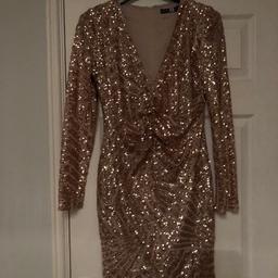 Gorgeous sparkly dress. Ideal for Christmas parties. Only worn once. As new condition. From smoke and pet free home.