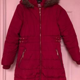 Lovely warm padded coat with fur trimmed hood.  Perfect for winter.  Good condition. From smoke and pet free home.