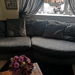 black and grey sofa with spining love chair 
good clean condition
have for 6 years 
genuine wear and tear
one cushion slighty softie, 
had to saw sofa  under  due to small rip while moving (see picture 3) but cant see and doesn't effect of the use 
welcome to come view 
can deliver locally for £10 extra fuel cost