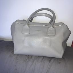 Designer bag leather with inside pockets perfect for hand luggage. Originally was £150.00