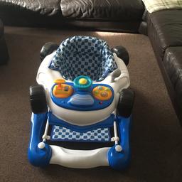 Baby racing car walker/rocker. Comes with bounce mat. In excellent condition as it’s hardly been used. Lights up and plays music 
Collection from Feltham