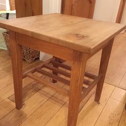 Oak lamp table, slight mark on top but blends in with tone of wood .
