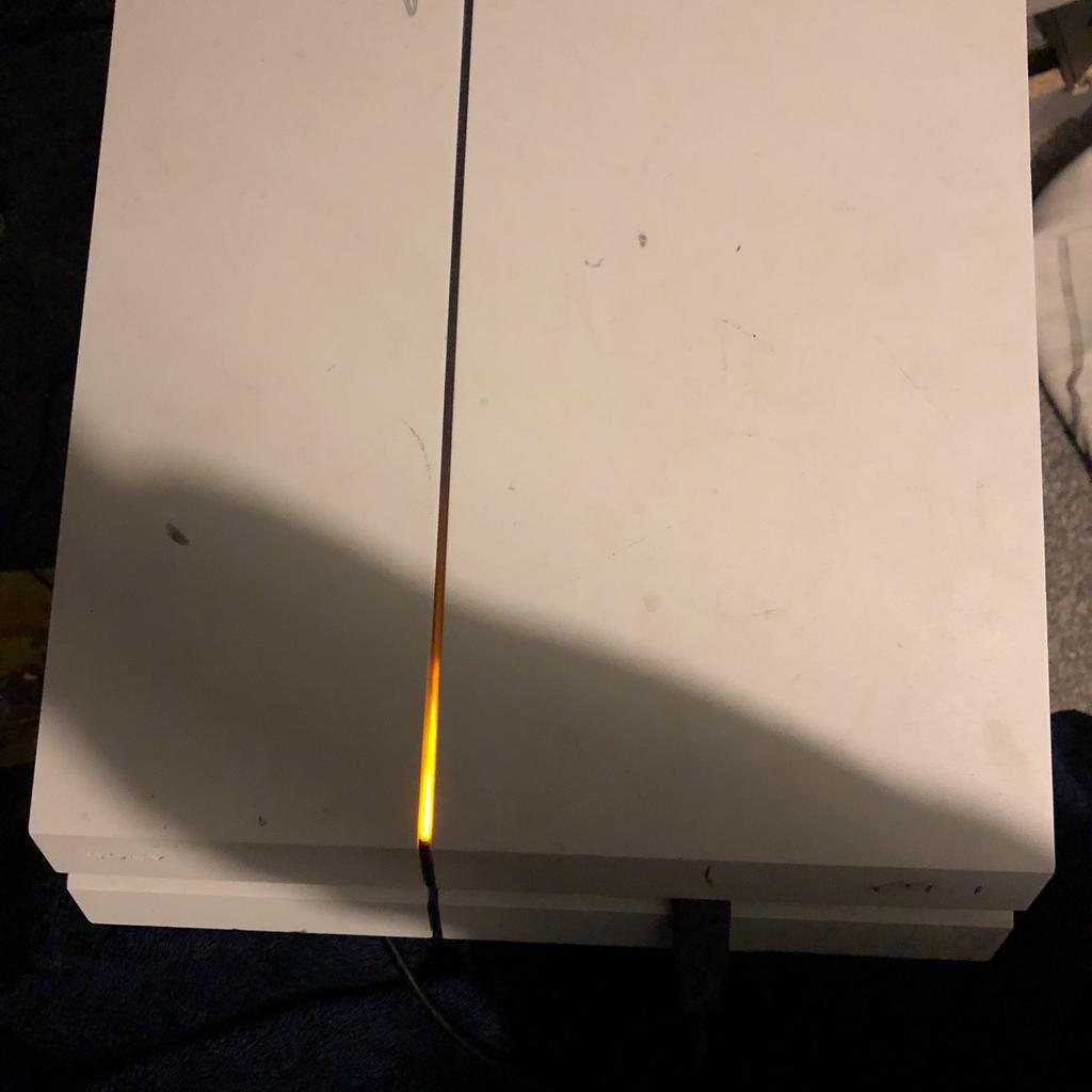 White ps4 in perfect condition
Comes with games- Gta V red dead redemption 2 cod WW2 and Black ops 3 also minecraft
Minimal sound while using
Comes with required cables
Does not include controller
Reason for selling doesn’t get used
Has some ink marks