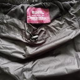 Black Mountain Warehouse.
Zips on bottow of legs to easy take off. 
Used for D of E expedition.